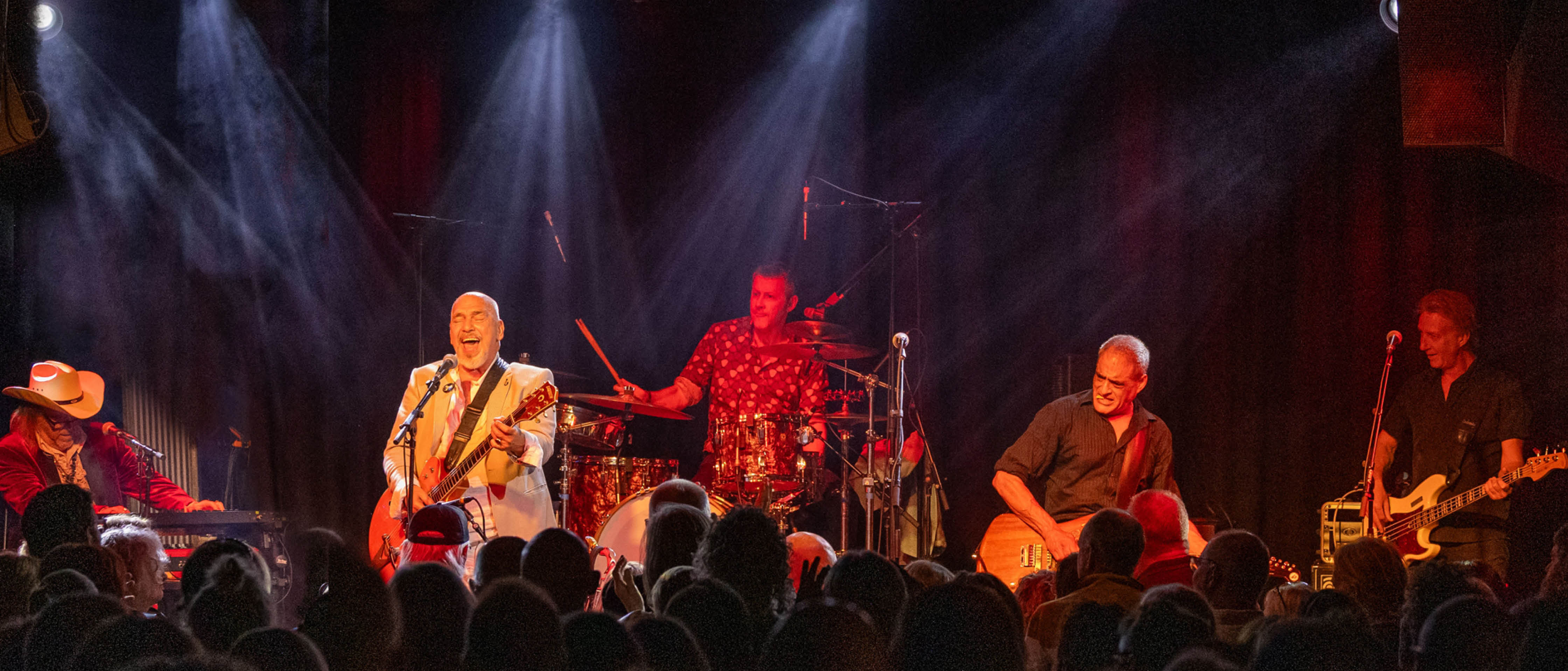 Joe Camilleri and The Black Sorrows performing live on stage